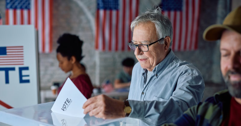 Senior citizen voting on us election day at the polls